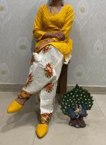 Mustard Cambric Cotton Party Wear Sequins Work Kurti With Patiyala