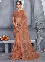 Dusty Peach Net Wedding Wear Embroidery Work Saree