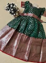 Green Soft Banarasi Traditional Wear Kanchi Border Work Kids Wear Readymade Gown With Belt