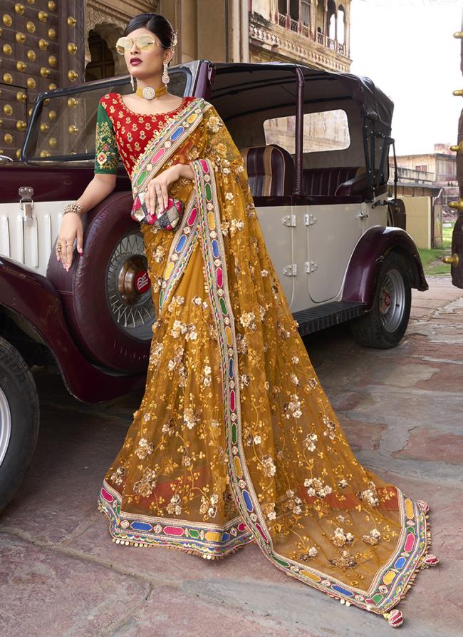 Mustard Net Reception Wear Sequinned Saree