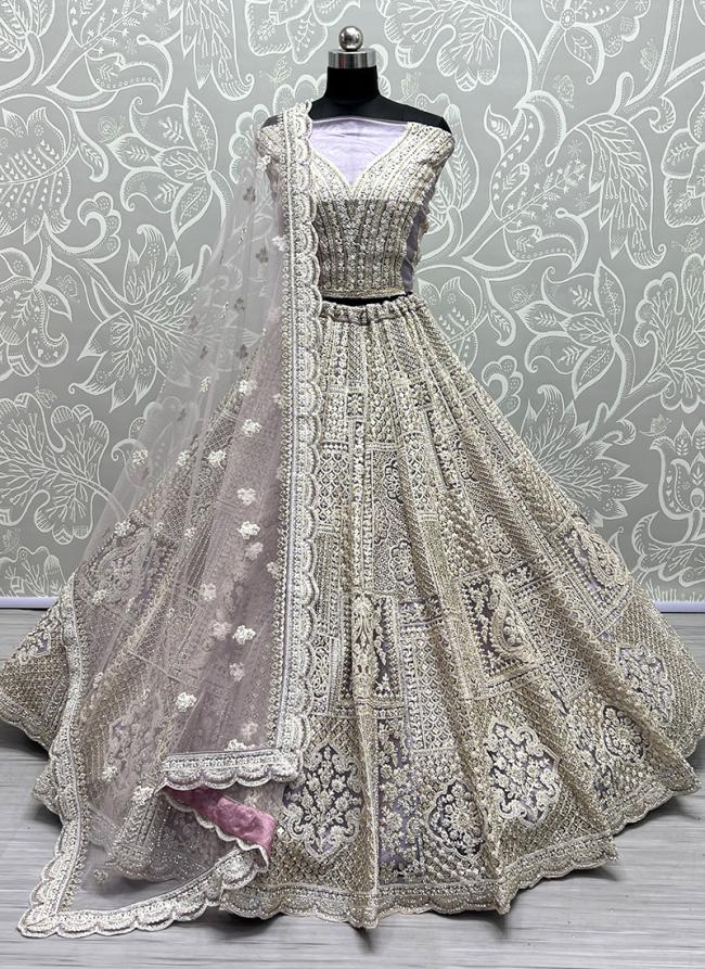 Off White Net Wedding Wear Embroidery Work Lehenga Choli