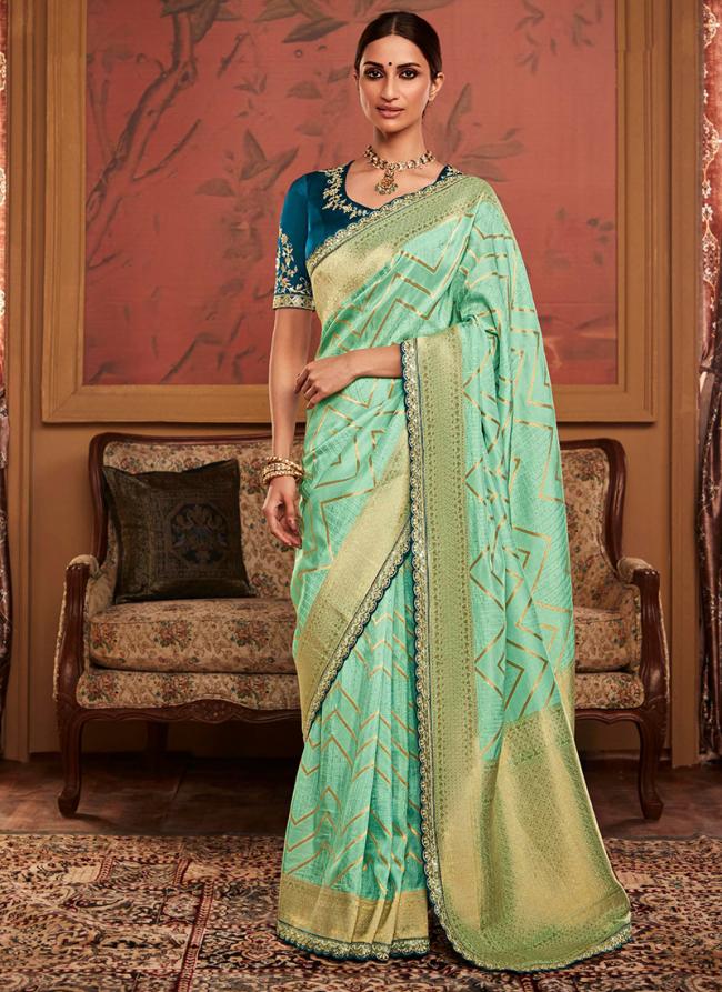 Pista Green Dola Silk Wedding Wear Embroidery Work Saree