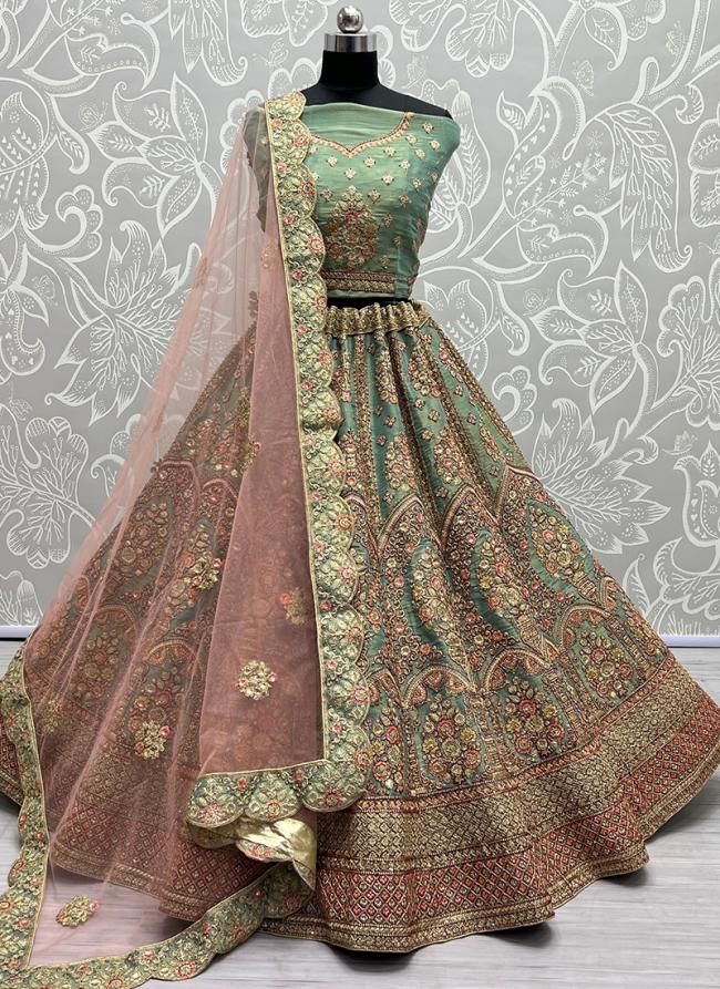 Pista Green Net Bridal Wear Embroidery Work Lehenga Choli