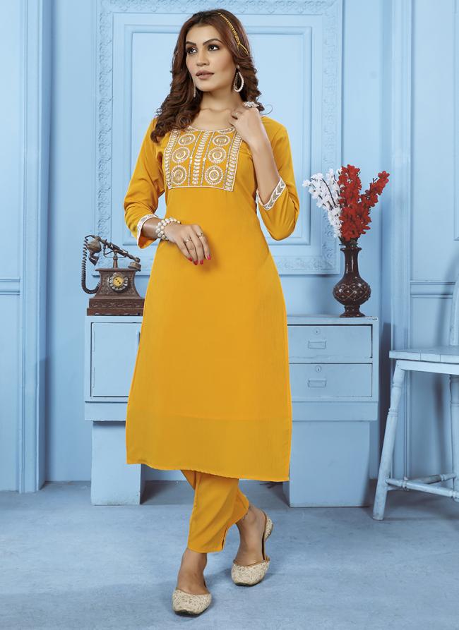 Yellow Cotton Daily Wear Embroidery Work Kurti With Pant