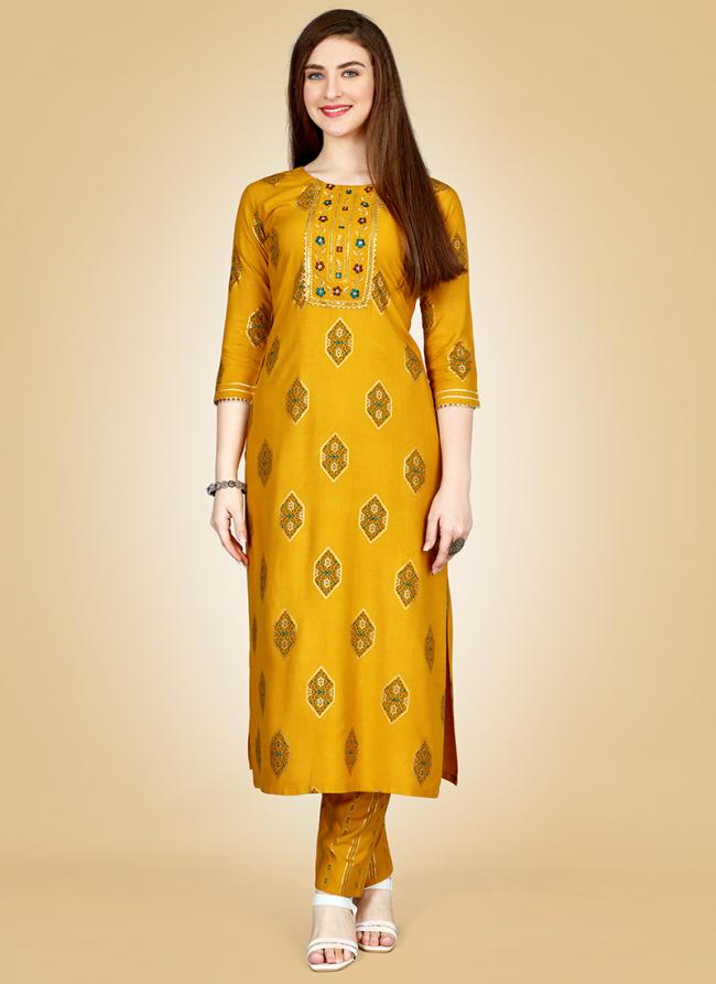 Yellow Rayon Casual Wear Embroidery Work Kurti With Pant
