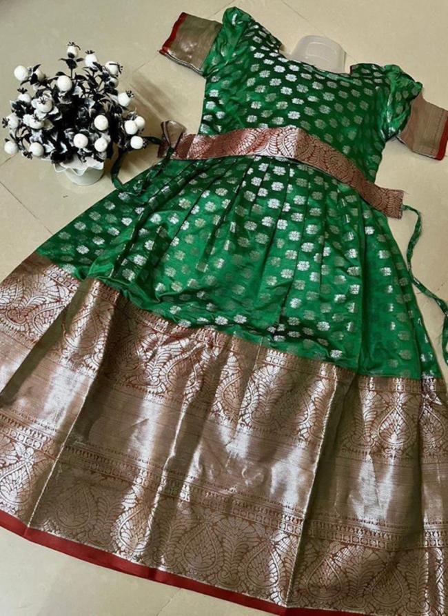 Green Soft Banarasi Traditional Wear Kanchi Border Work Kids Wear Readymade Gown With Belt