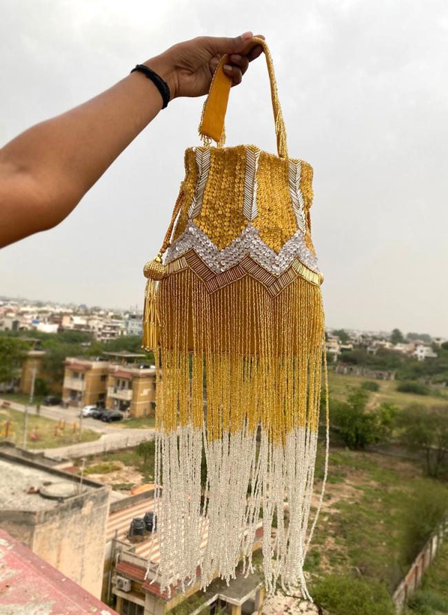   Party Wear  Yellow Embroidered Fringe Potli Bag